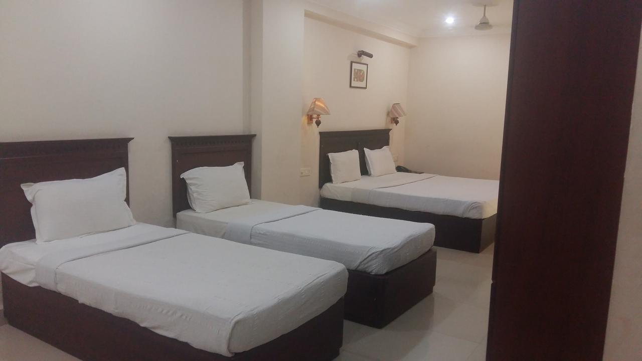 Hotel Horizon International Guruvayur Room photo